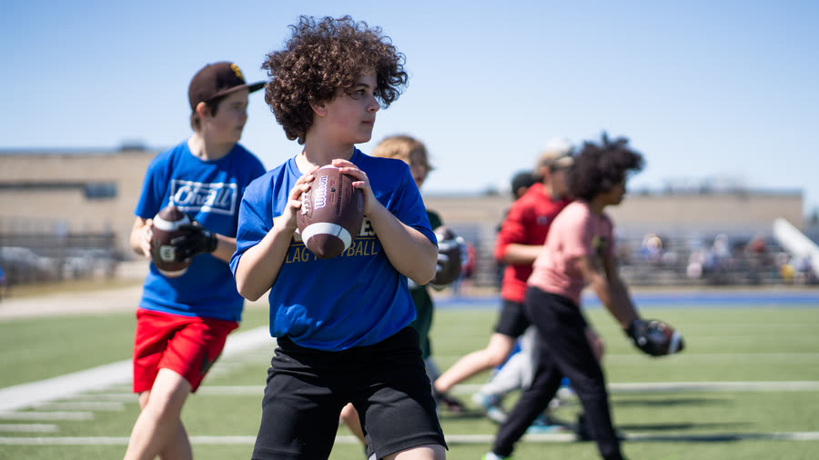 Youth athletes practicing flag football in Winnipeg.